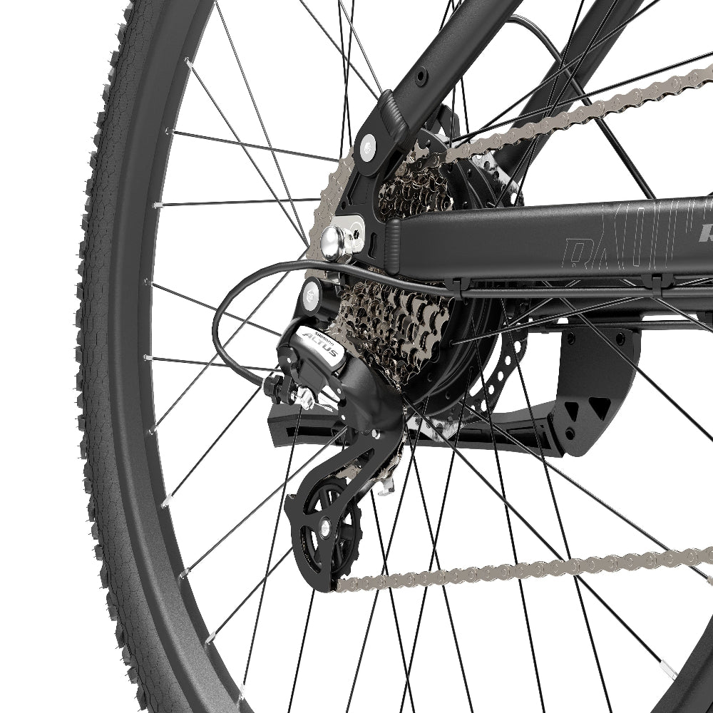 Close-up of a bicycle's rear wheel and gear system on a white background