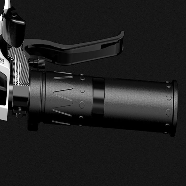 Close-up of a black motorcycle throttle grip on a dark background