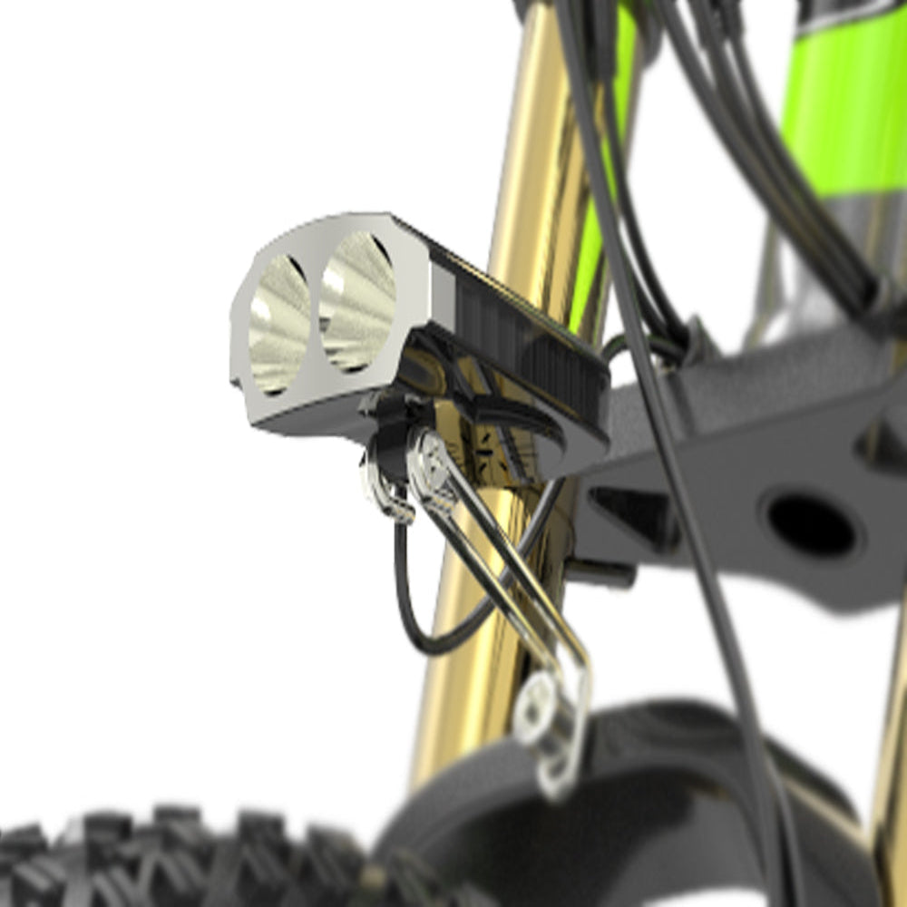 Close-up of a bike light attached to a bicycle frame with a white background