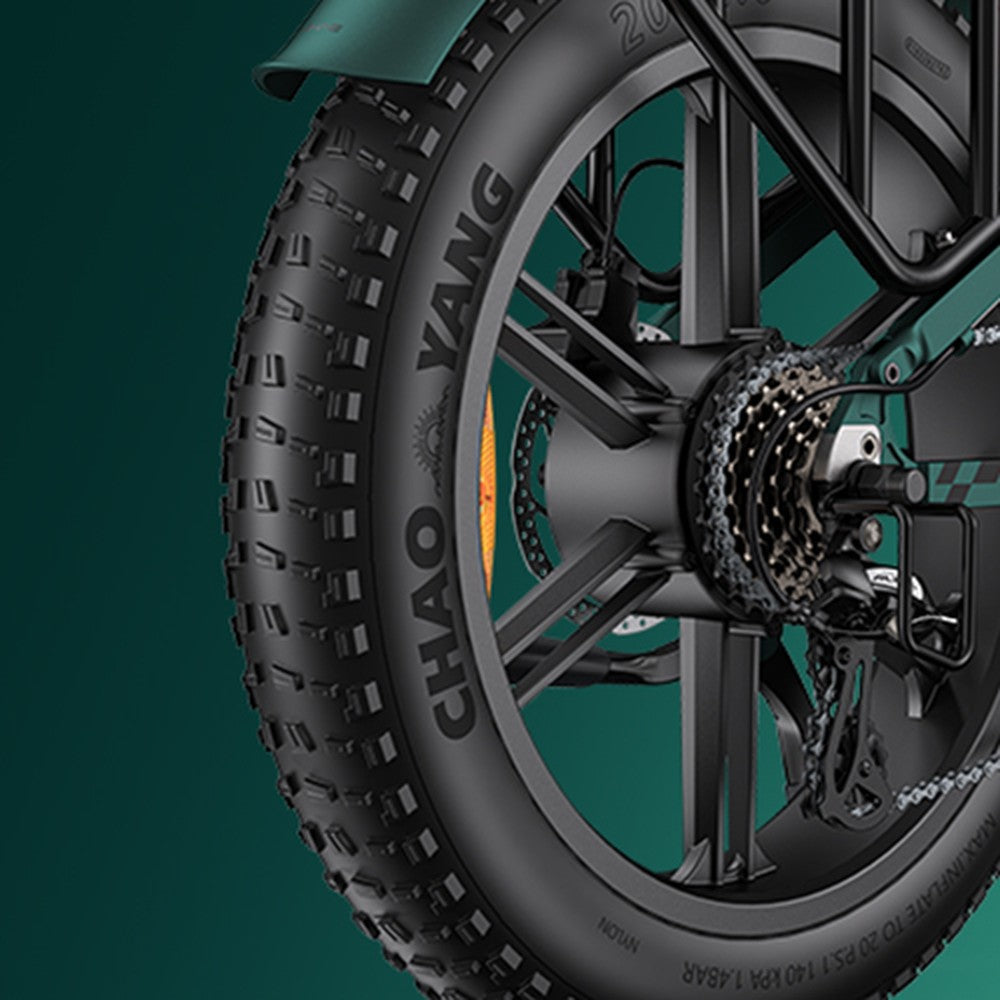 Close-up of a motorcycle wheel with 'Chao Yang' branding on a green background