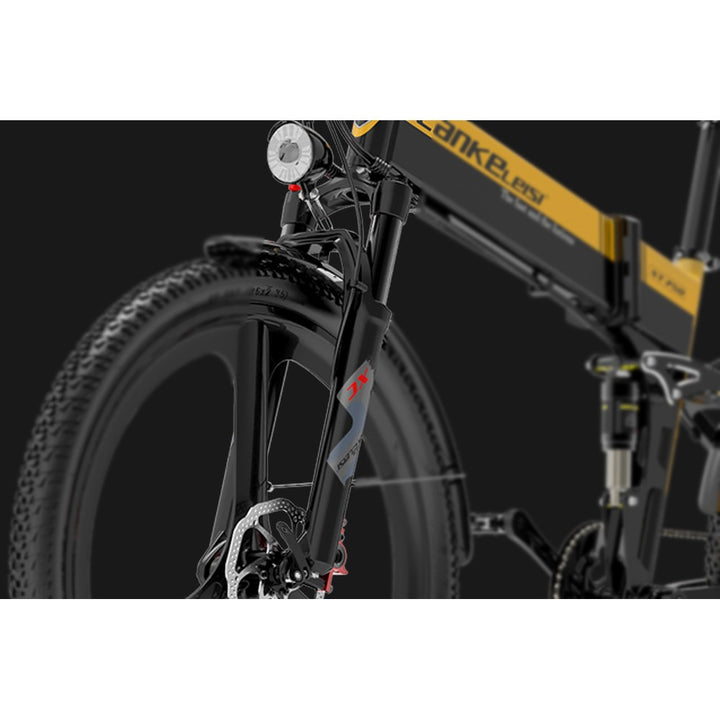 Close-up of a bicycle with a black and yellow frame on a dark background