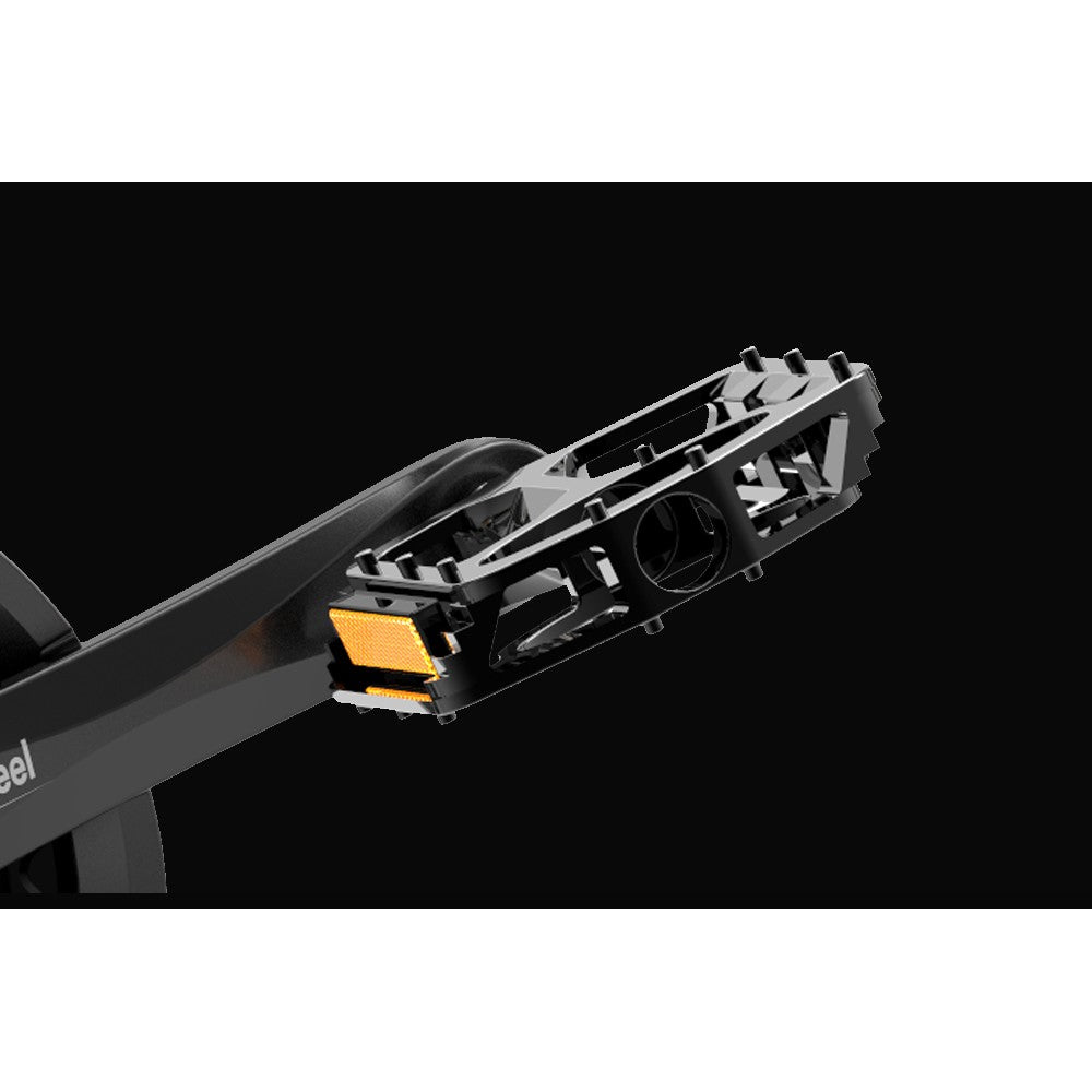 Close-up of a black metal bracket with a yellow label on a white background