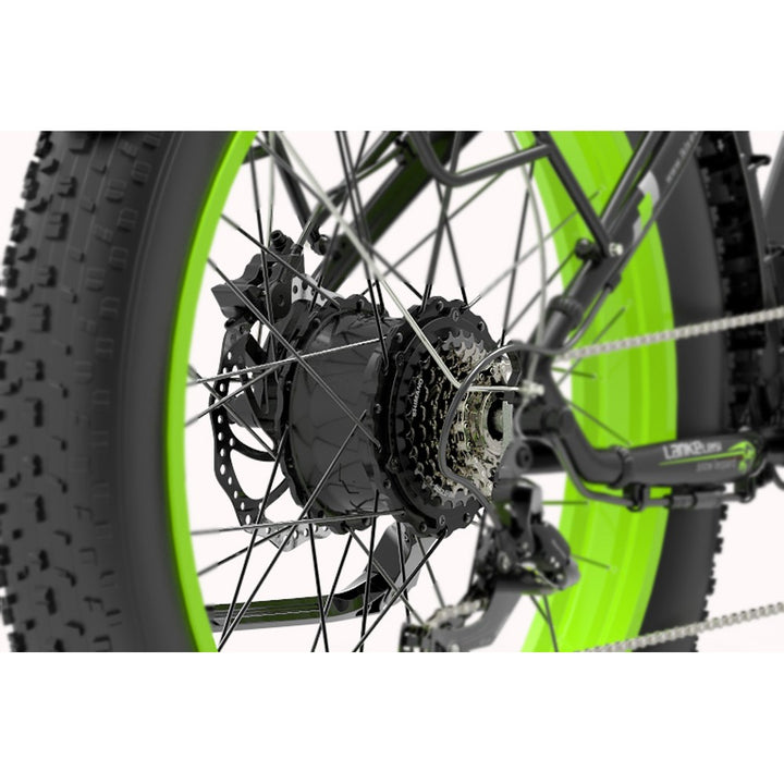 Close-up of a bicycle wheel with a green rim and chain mechanism on a white background