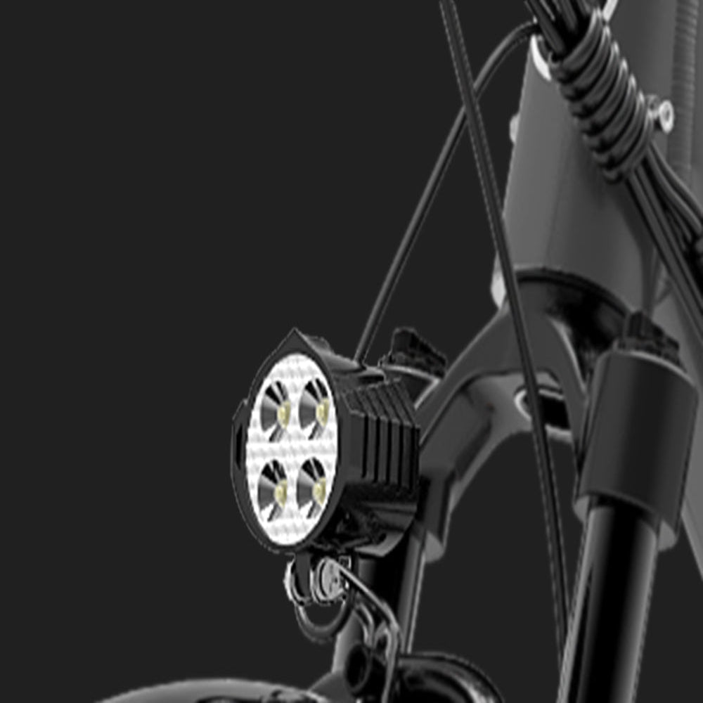 Bicycle light attached to a bike frame with a black background