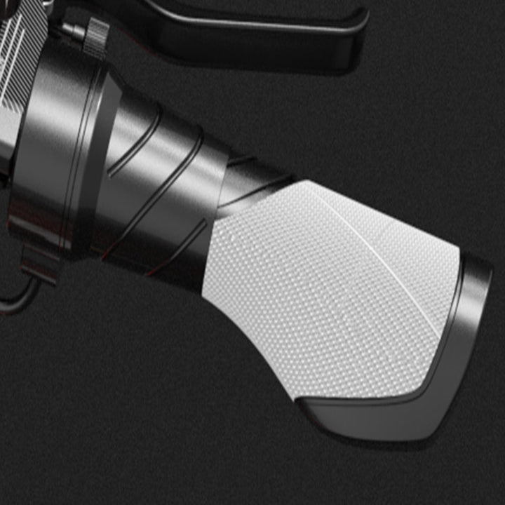 Close-up of a motorcycle handlebar with a textured grip on a dark background