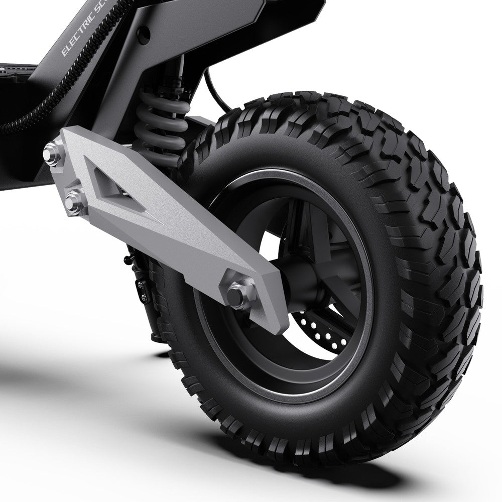 Close-up of a black off-road tire with tread pattern on a white background
