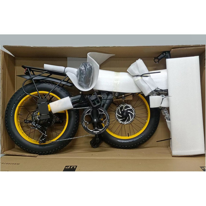 e-bike with yellow wheels in a cardboard box