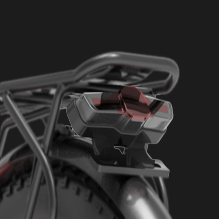 Close-up of a metallic bike rack with a dark background