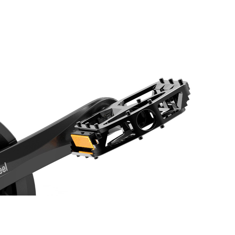 Close-up of a black metal product with a yellow component on a white background