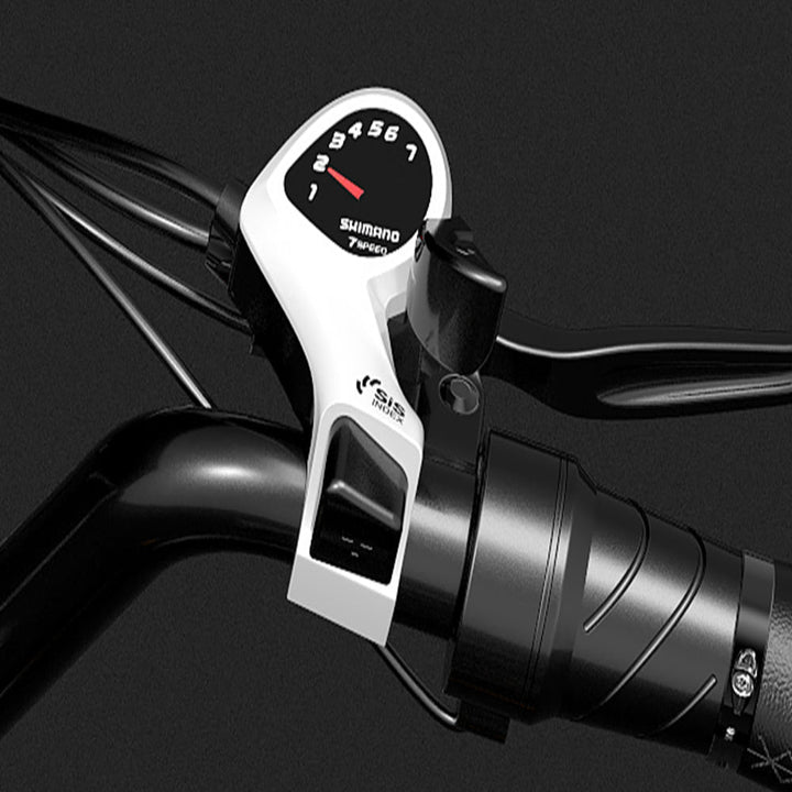 Close-up of a bicycle handlebar with a Shimano shift lever on a black background
