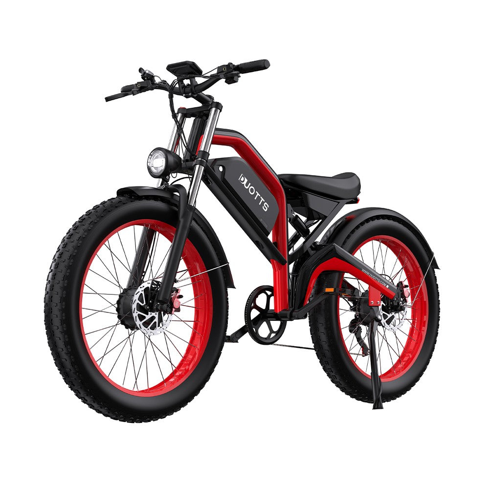 Black and red electric bike on a white background