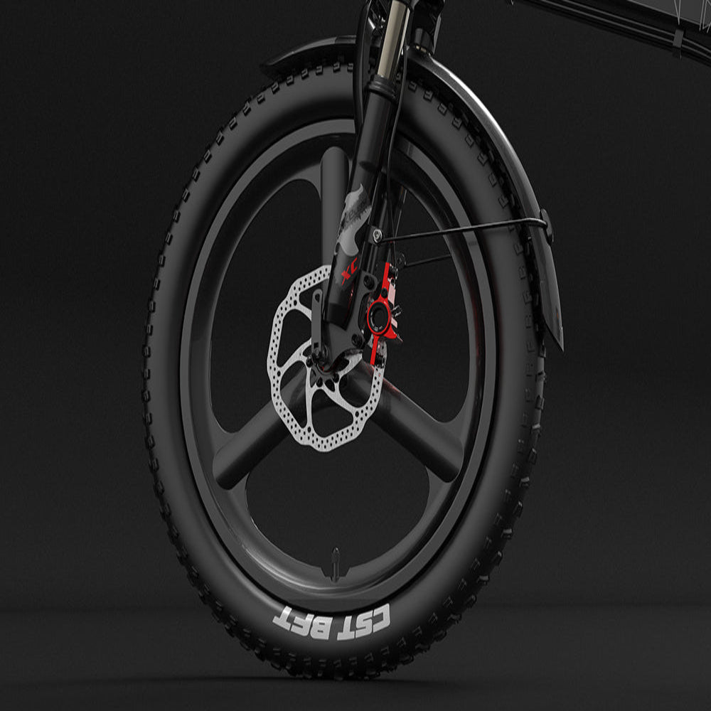 Close-up of a bicycle wheel with disc brake system on a black background