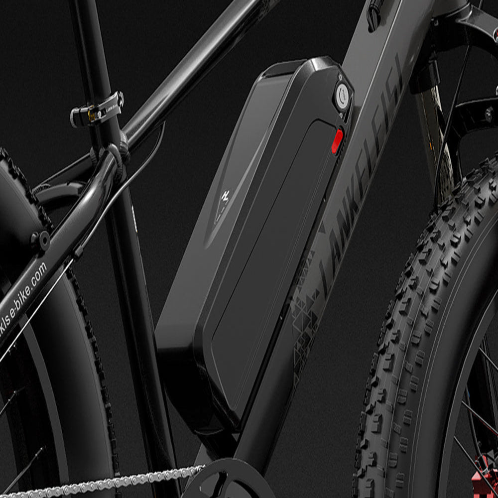 Close-up of a black electric bike with a battery pack on a dark background