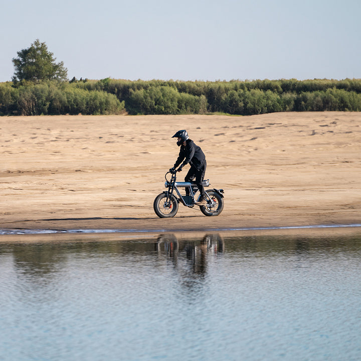 "COS CT20S Electric Bike with long-range battery, fat tires, dual suspension, and Shimano 7-speed system"