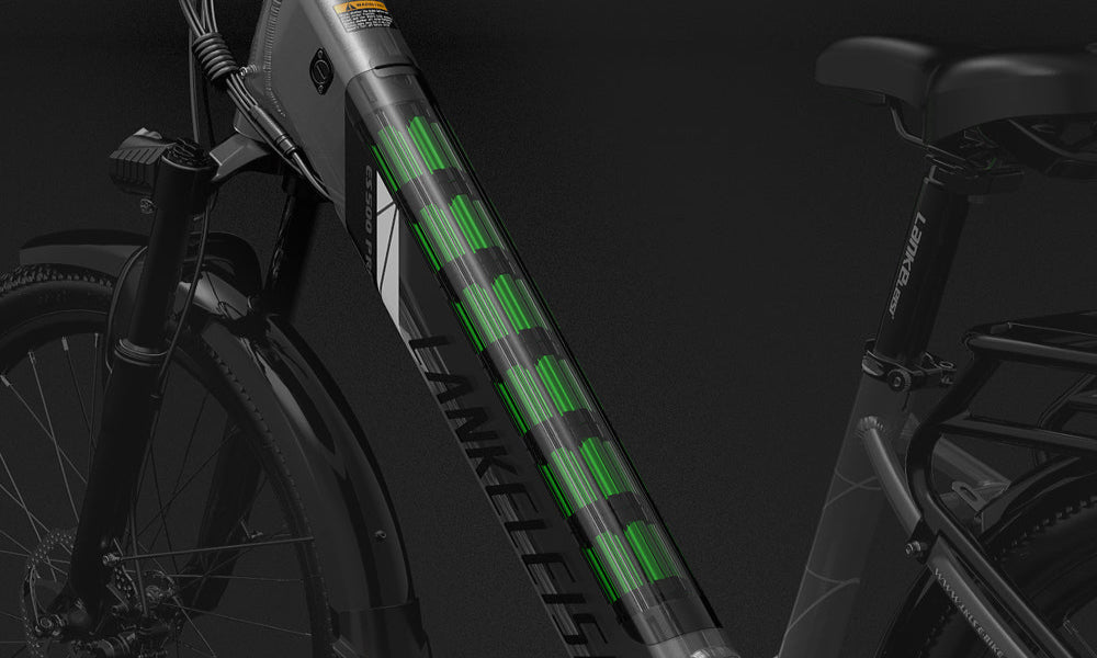 Close-up of a bicycle with a green light on a black background