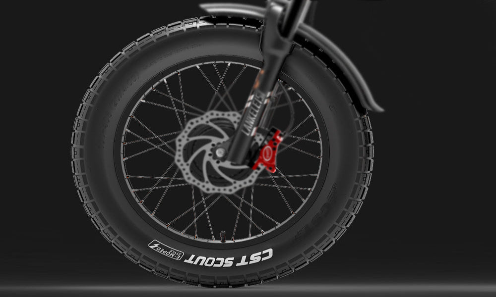 Close-up of a bicycle wheel with a disc brake system on a black background