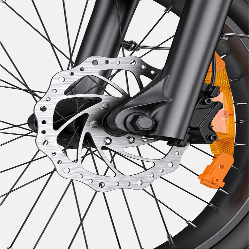 Close-up of a bicycle wheel with disc brake system on a white background