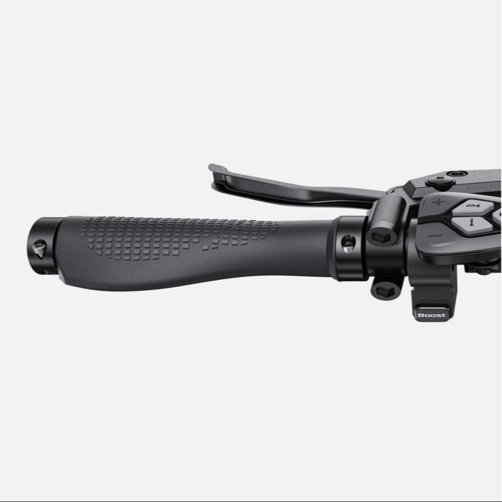 Close-up of a motorcycle throttle and grip on a white background