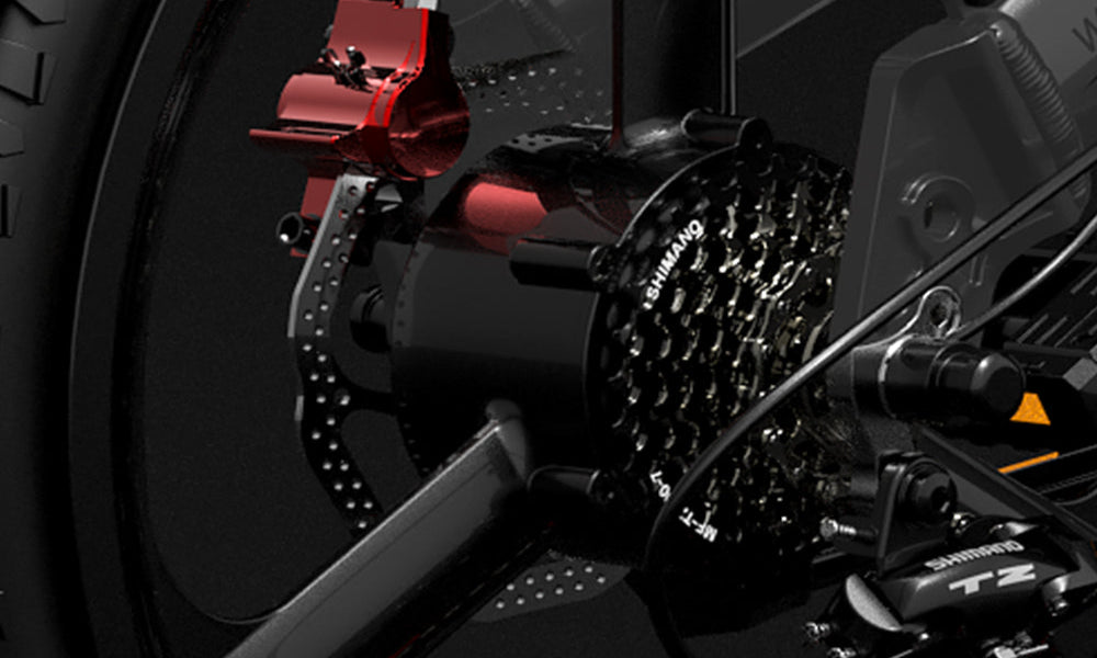 Close-up of a bicycle chain and gear system with Shimano branding on a dark background.