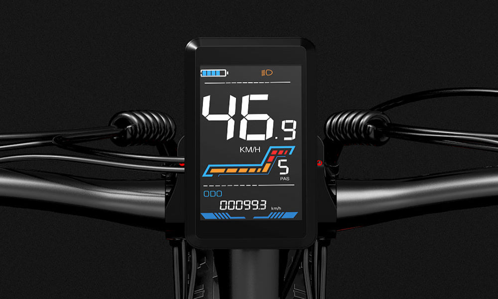 Digital display on a bicycle handlebar with speed and distance information.