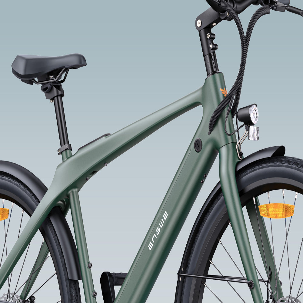 Green electric bicycle with 'enve' branding on a light blue background