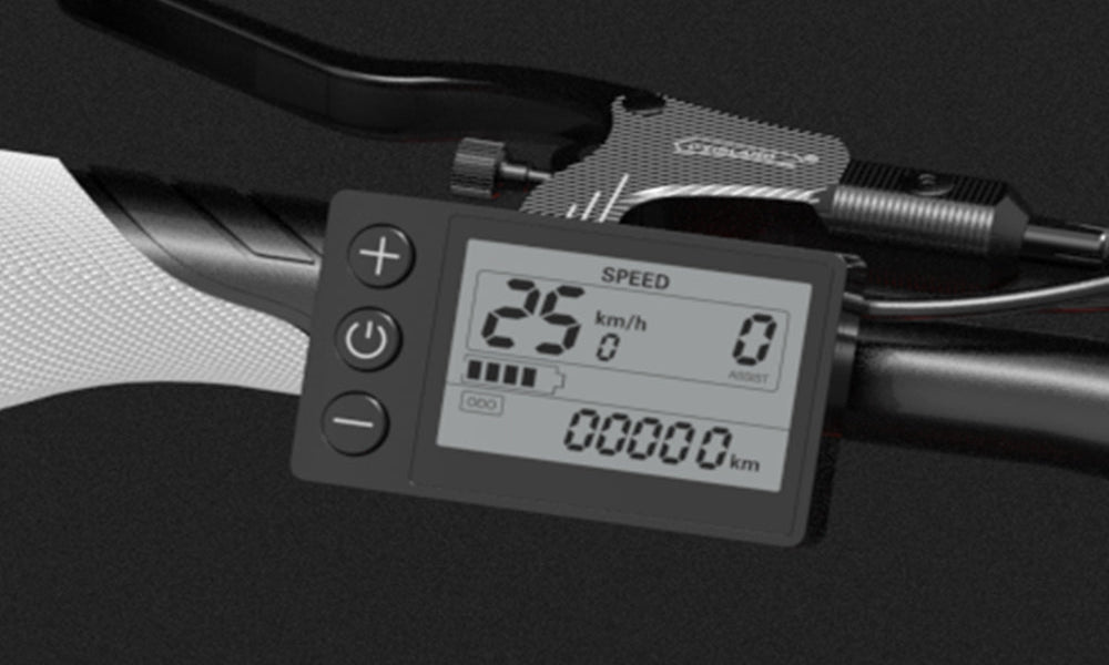 Digital speedometer on a bicycle handlebar with a black background