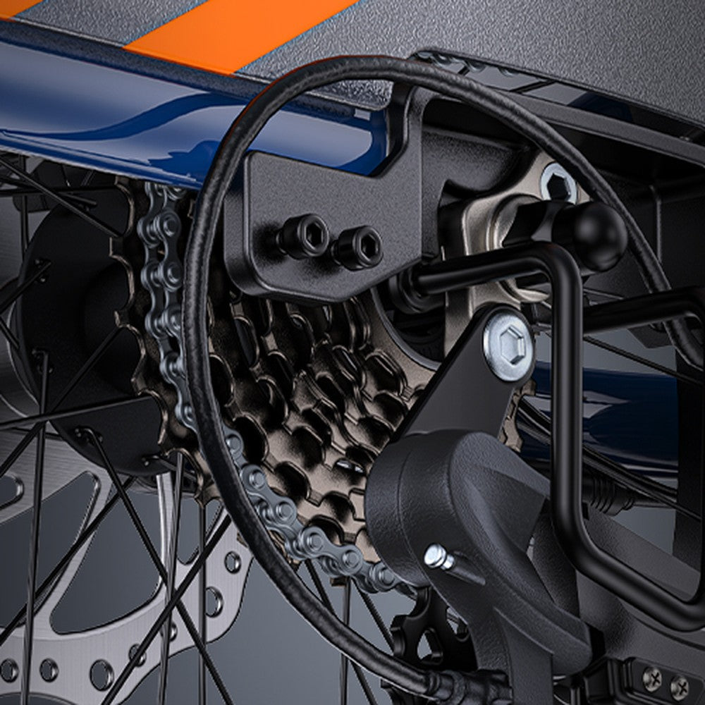Close-up of a motorcycle chain and sprocket system with a blurred background