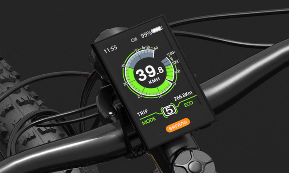 Digital display on a bicycle handlebar showing speed and other metrics.