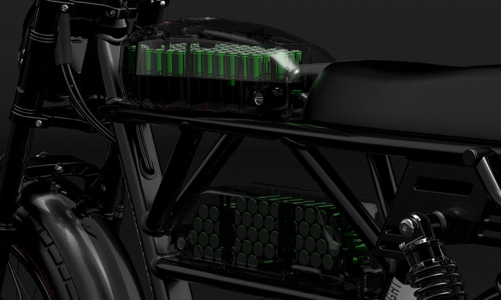 Close-up of a motorcycle's front suspension and headlight area with a dark background.