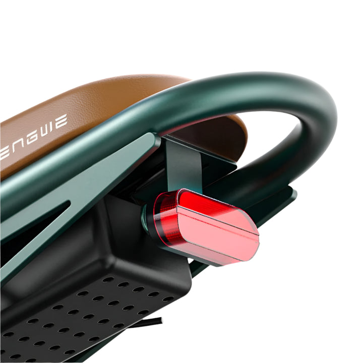 Close-up of a bicycle handlebar with a red brake lever on a light gray background