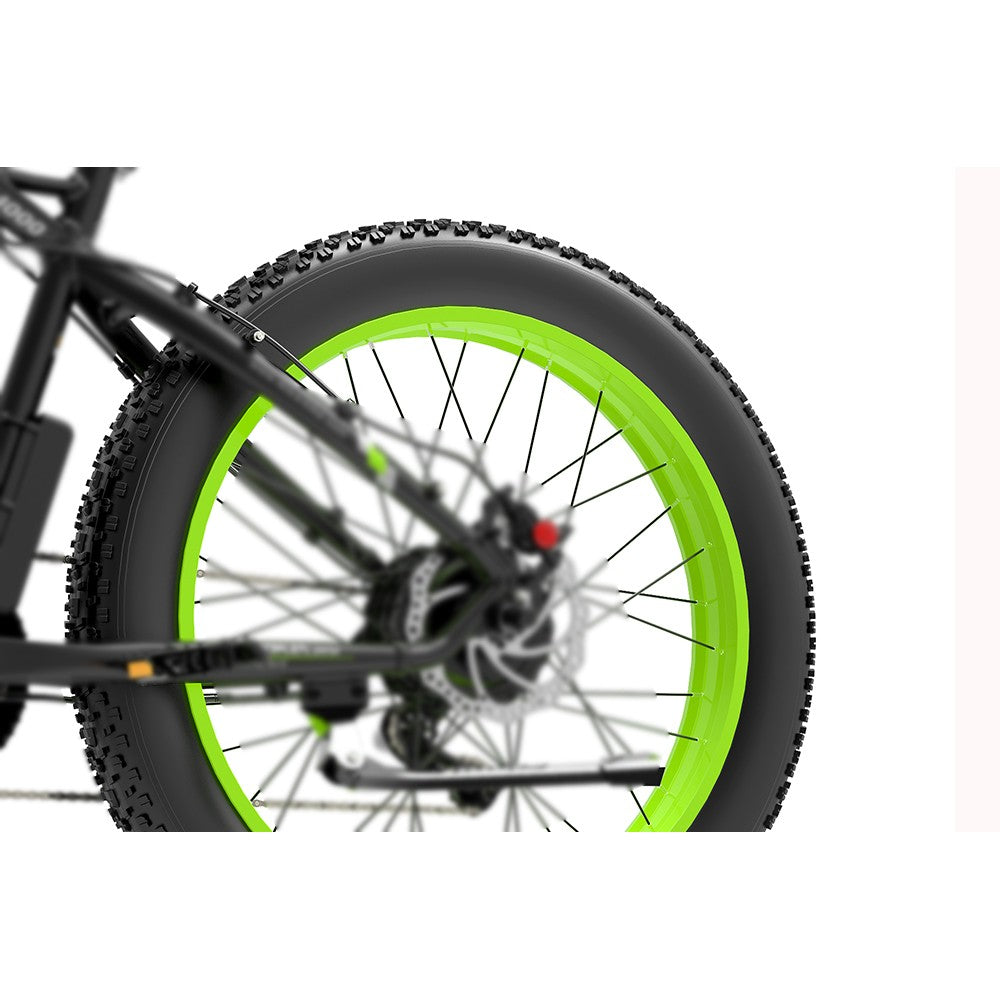 Close-up of a bicycle wheel with green rim on a white background