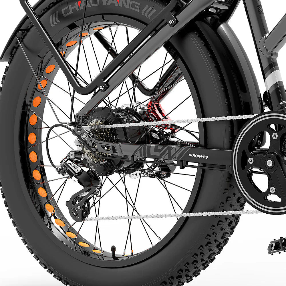 Close-up of a bicycle wheel with chain and gear system on a white background