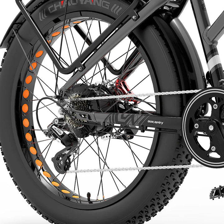 Close-up of a bicycle wheel with chain and gear system on a white background