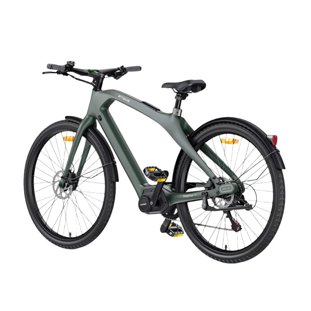 Green electric bicycle on a light gray background