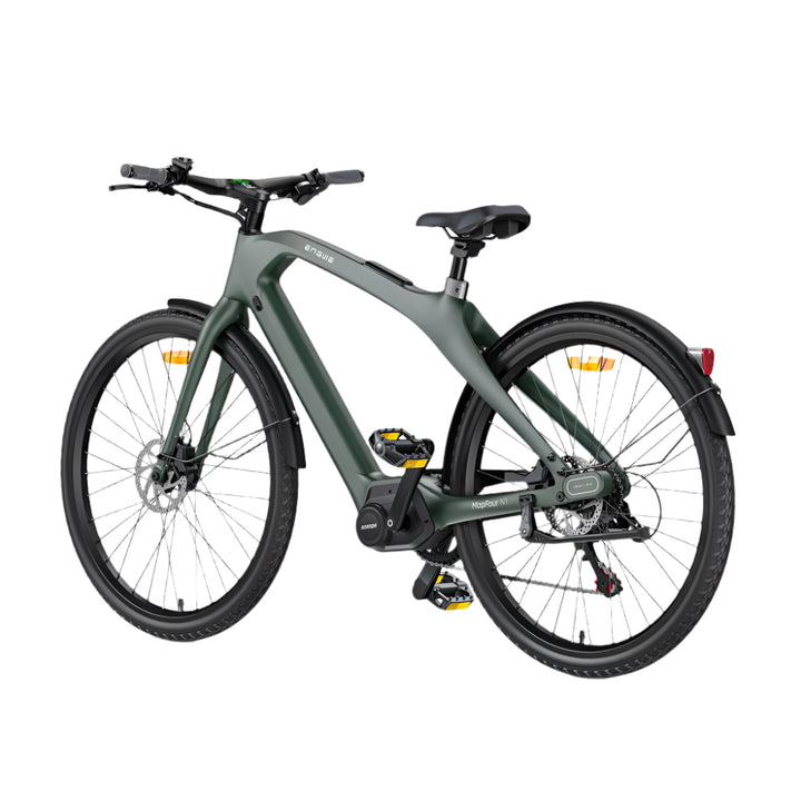 Green electric bicycle on a light gray background