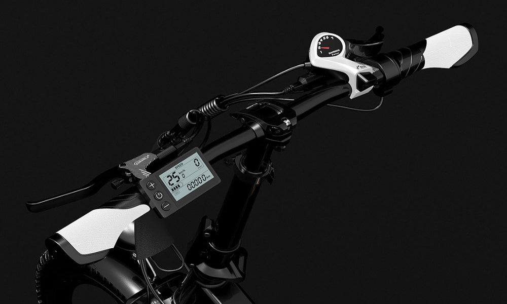 Close-up of a bicycle handlebar with digital display on a black background