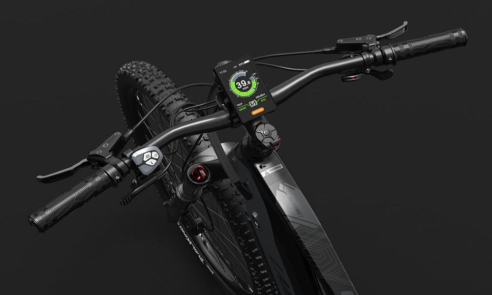 Close-up of an electric bike's handlebar with a digital display on a black background
