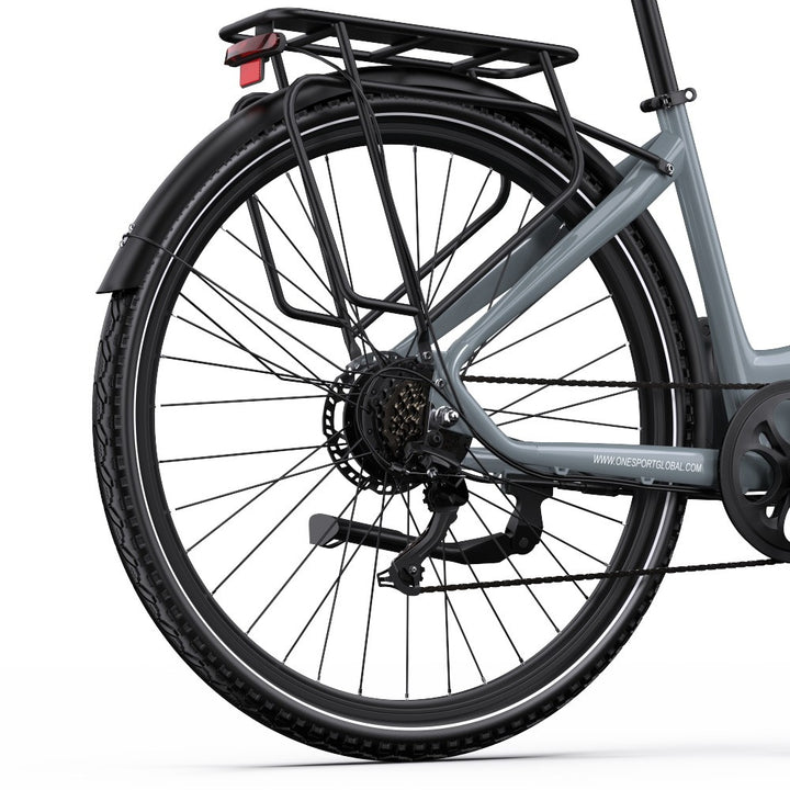 Close-up of a bicycle wheel with a carrier on a white background