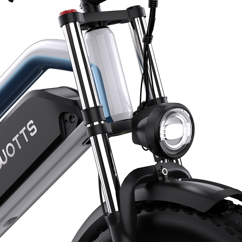 Close-up of a scooter's front suspension fork and headlight with 'DUOTTS' branding.