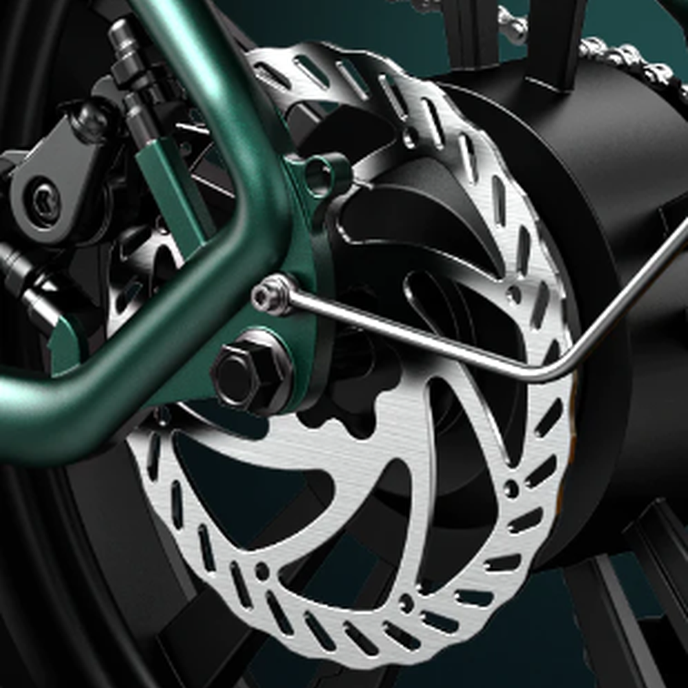 Close-up of a motorcycle brake disc and caliper with green frame.