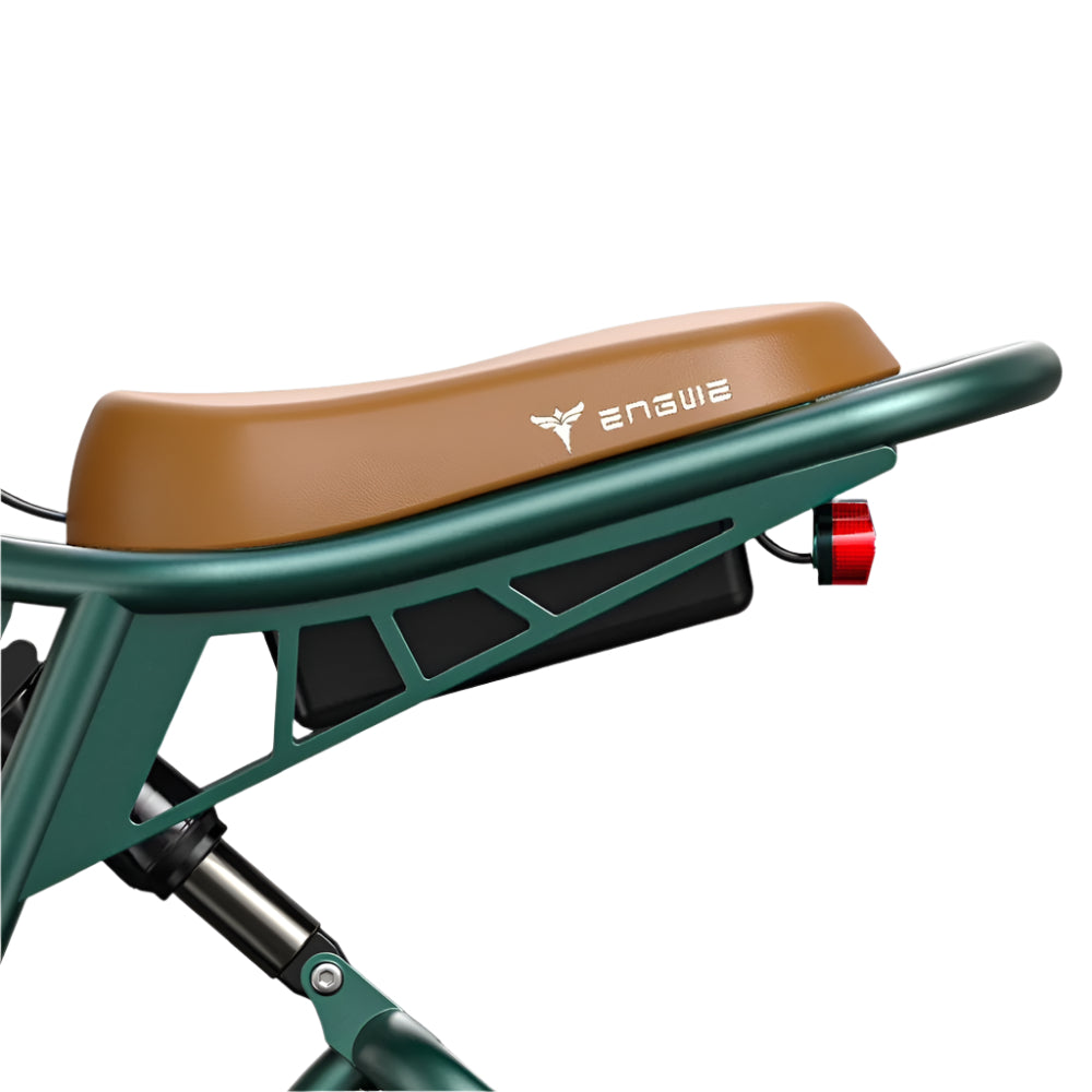 Close-up of a bicycle seat with a brown cushion and green frame on a white background.