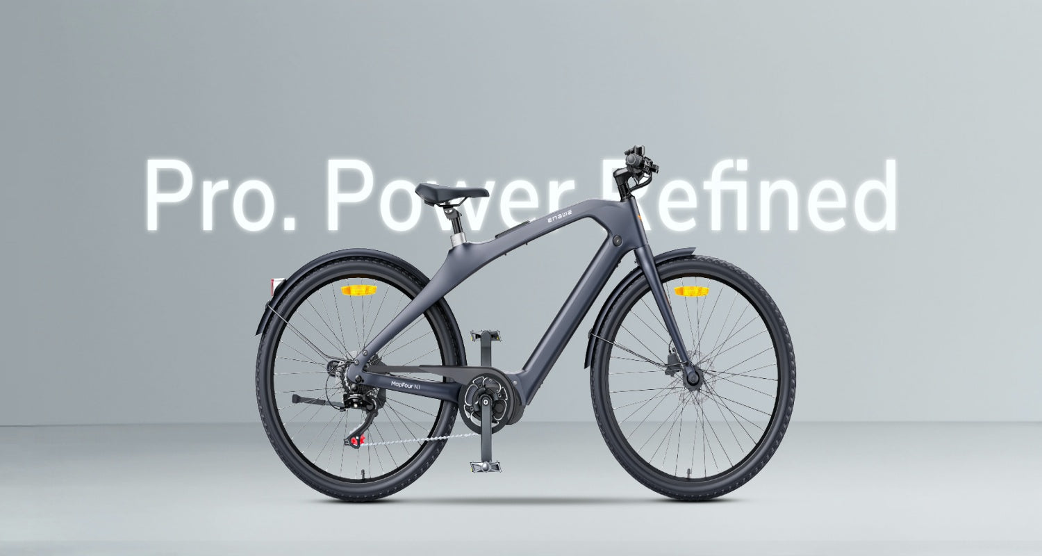 Elektrische fiets met 'Pro. Power Defined' tekst op een grijze achtergrond