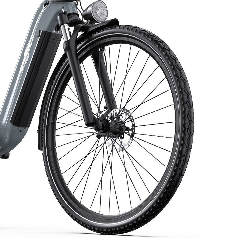 Close-up of a bicycle wheel with suspension fork on a white background