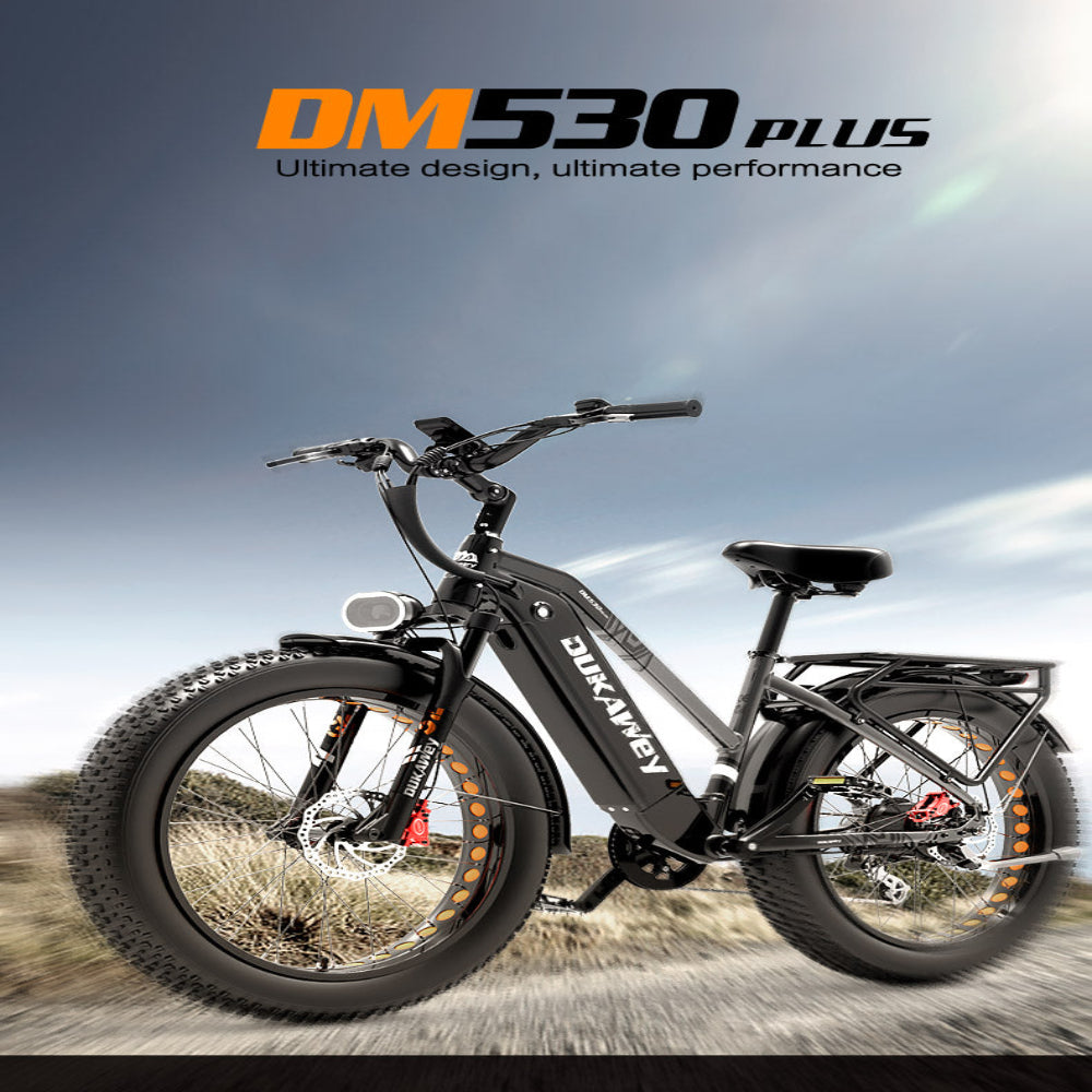 Electric bike with 'DM530 Plus' branding against a blurred natural background