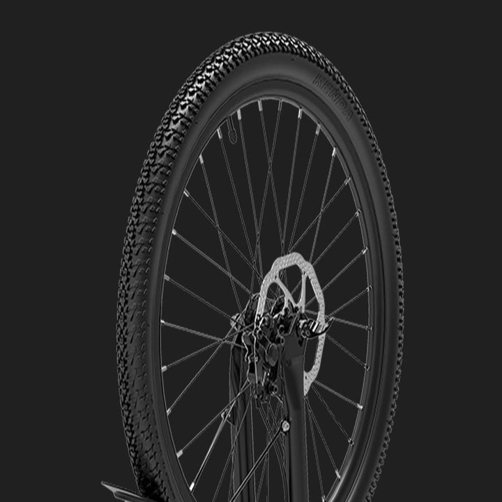 Bicycle wheel with tire and rim on a black background