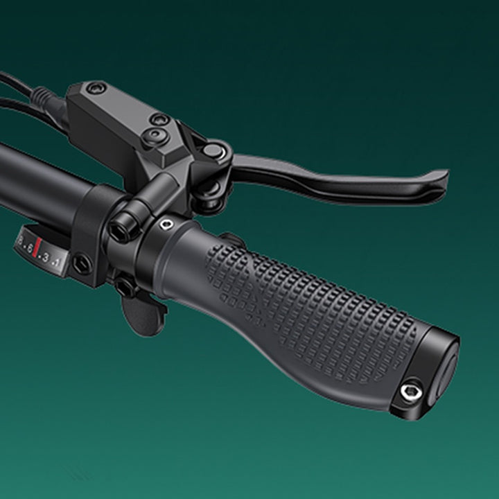 Close-up of a black motorcycle handlebar with grip and control buttons on a green background