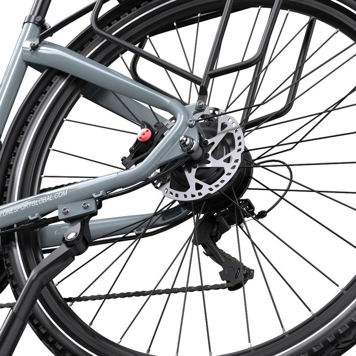 Close-up of a bicycle wheel with disc brake system on a white background