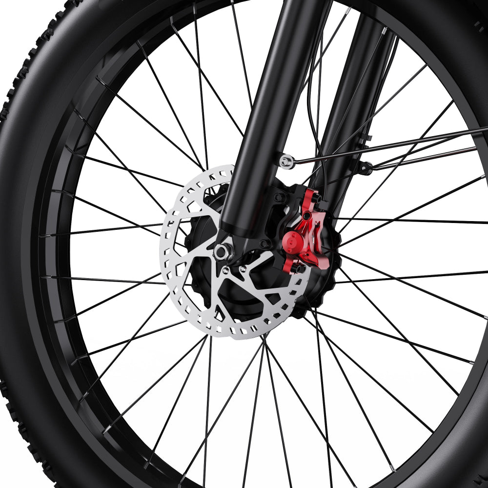 Close-up of a bicycle wheel with disc brake system on a white background