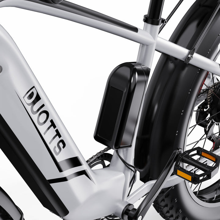 Close-up of a bicycle with 'DuottS' branding on a white background