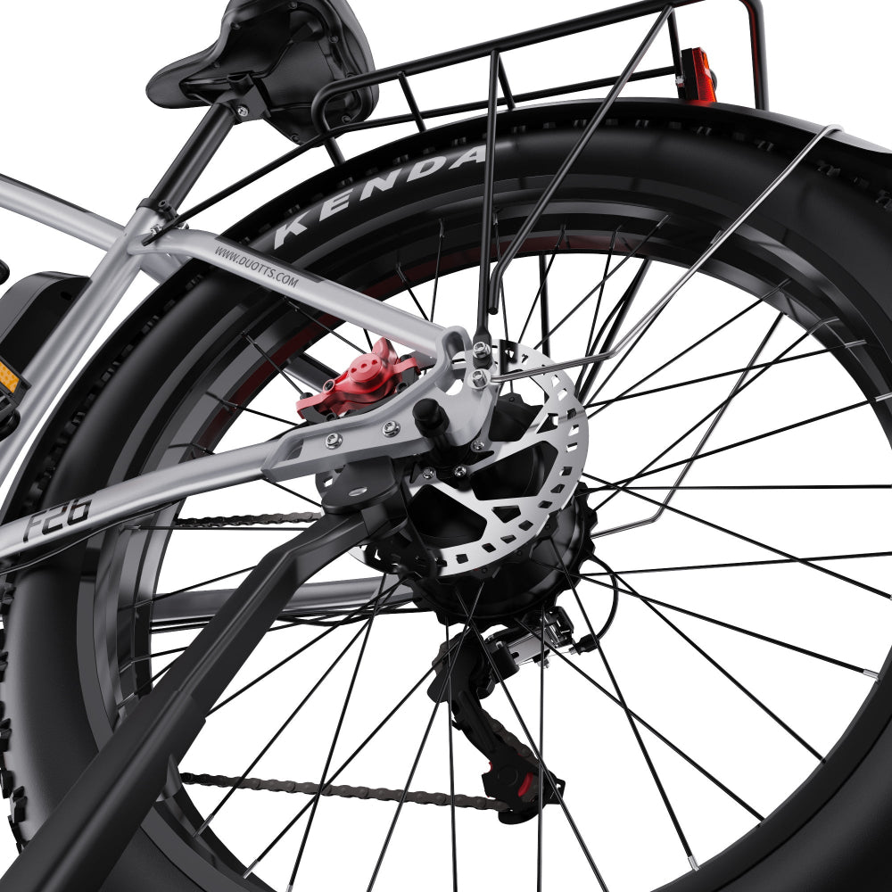 Close-up of a bicycle wheel with disc brake system on a white background